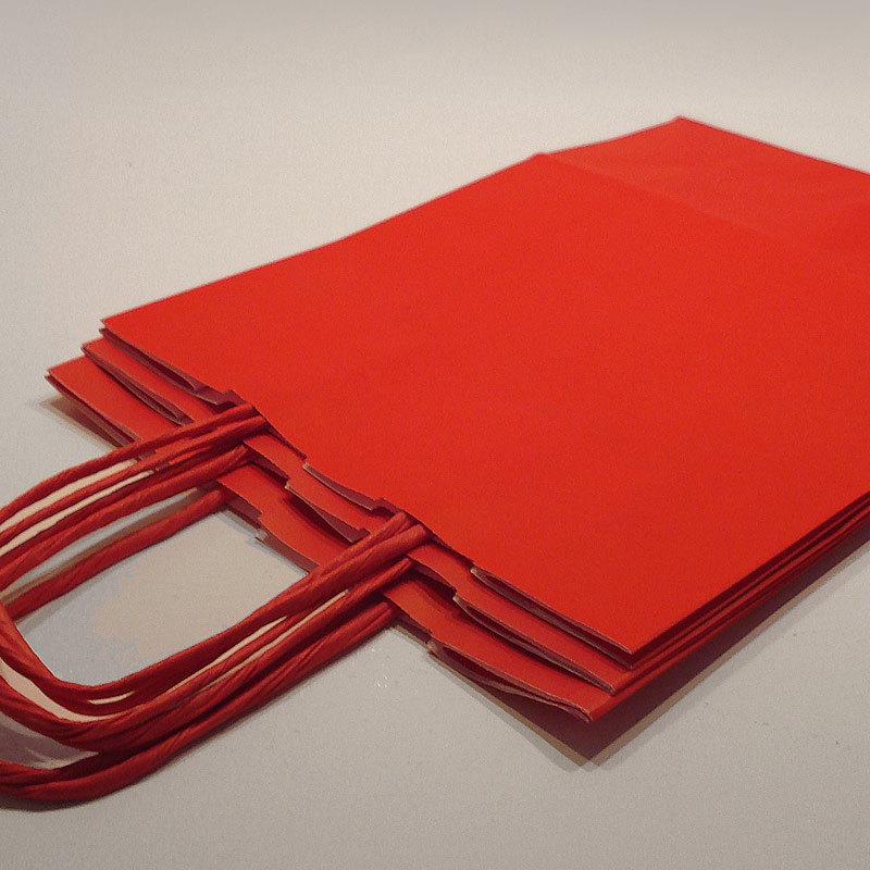 Three simple small red twist handle paper gift bags. Perfect for stencilling on.
3 x 18cm/7
