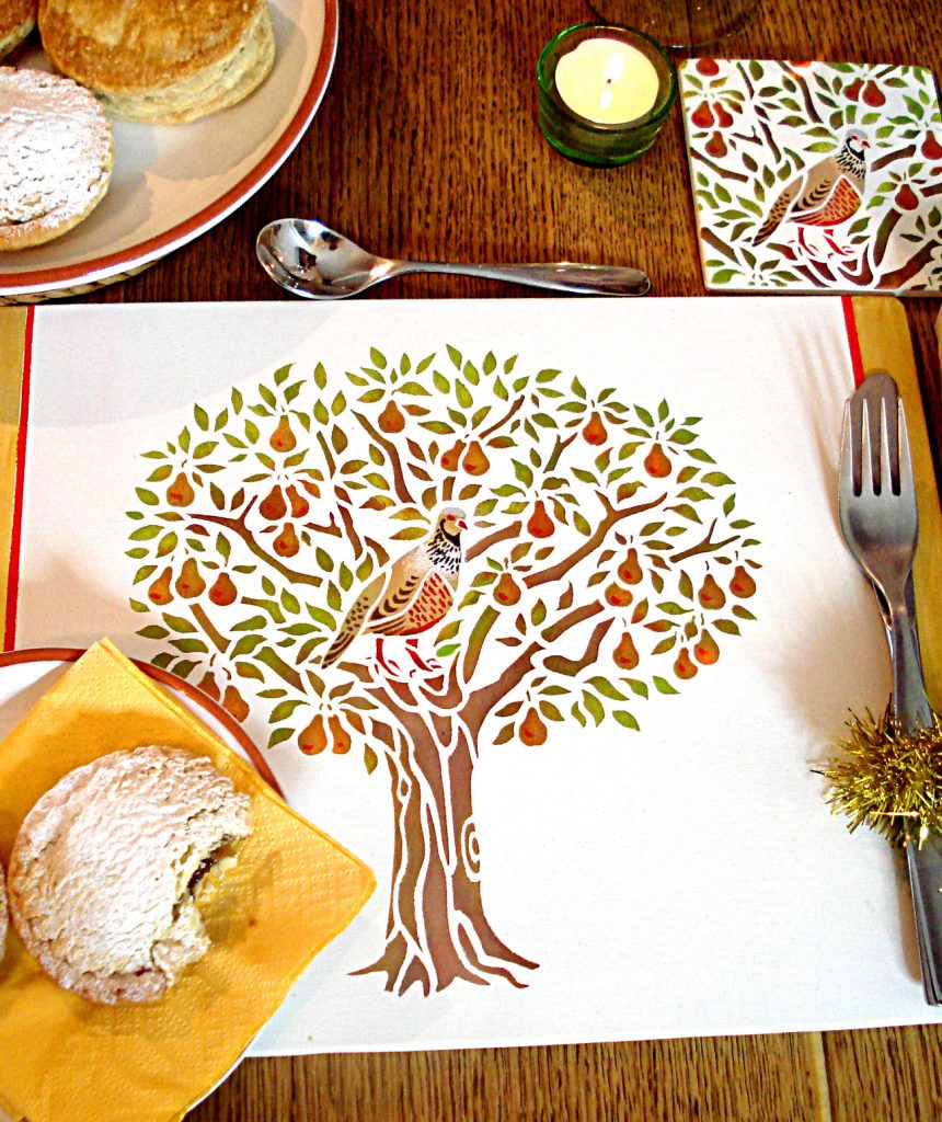 Charming adaptation of the popular
Partridge in a Pear Tree theme!
One sheet with two layer partridge stencil
The Partridge in a Pear Tree Stencil - is a beautiful Christmas themed design of a fully fruiting pear tree and distinctive partridge bird. Ideal for creating festive accessories, cards and gift wrap. See size specifications below. Why not try your hand at creating our special seasonal placemats and coasters, perfect for festive dining - see our how to guide below.